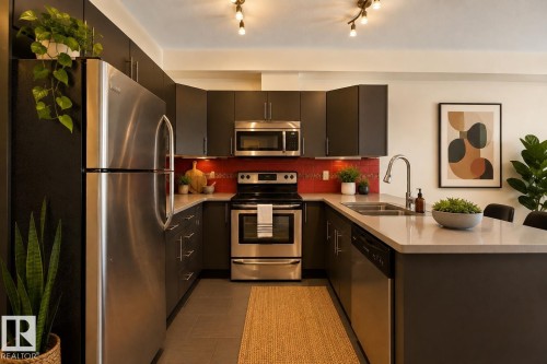 #303 10611 117 St Nw, Edmonton, AB - Indoor Photo Showing Kitchen With Stainless Steel Kitchen With Double Sink
