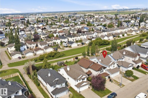 Aerial perspective showcasing a residential neighborhood with detached homes - 714 87 Street Sw, Edmonton, AB - Outdoor With View