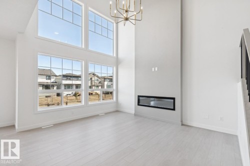 5033 Cawsey Link Sw, Edmonton, AB - Indoor With Fireplace