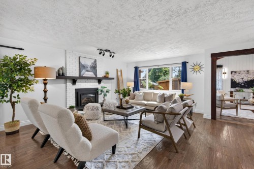 162 Mission Avenue, St. Albert, AB - Indoor Photo Showing Living Room With Fireplace