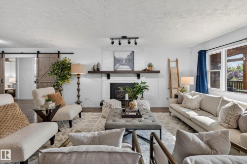 162 Mission Avenue, St. Albert, AB - Indoor Photo Showing Living Room With Fireplace
