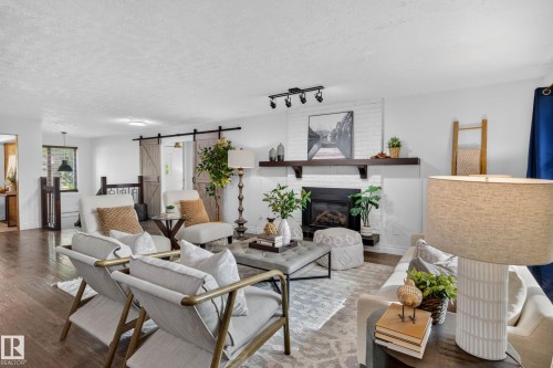 162 Mission Avenue, St. Albert, AB - Indoor Photo Showing Living Room With Fireplace