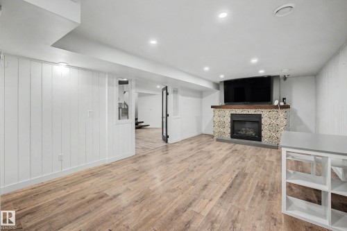 162 Mission Avenue, St. Albert, AB - Indoor Photo Showing Other Room With Fireplace