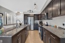 #301 9603 98 Av Nw, Edmonton, AB  - Indoor Photo Showing Kitchen With Double Sink With Upgraded Kitchen 