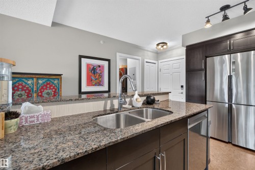 #301 9603 98 Av Nw, Edmonton, AB - Indoor Photo Showing Kitchen With Double Sink