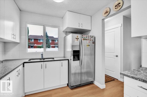 13225 47 Street Nw, Edmonton, AB - Indoor Photo Showing Kitchen With Double Sink