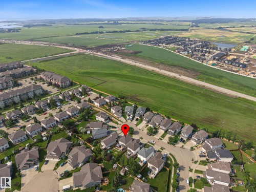 Aerial perspective highlighting a residential development with varied housing types - 21 Nash Close, St. Albert, AB - Outdoor With View