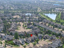 Residential community featuring multiple artificial lakes and established landscaping - 