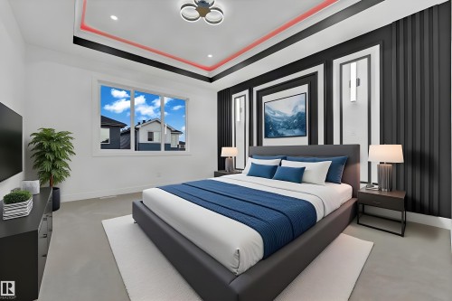 Recessed lighting, contemporary ceiling fixture, feature wall with vertical paneling, tray ceiling with accent lighting, and a large window - 4303 36 Street, Beaumont, AB - Indoor Photo Showing Bedroom