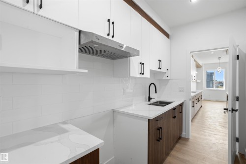 723 158 Avenue Ne, Edmonton, AB - Indoor Photo Showing Kitchen With Double Sink