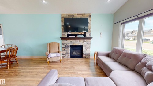 3809 52 Av, Drayton Valley, AB - Indoor Photo Showing Living Room With Fireplace