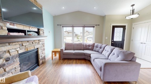 3809 52 Av, Drayton Valley, AB - Indoor Photo Showing Living Room With Fireplace
