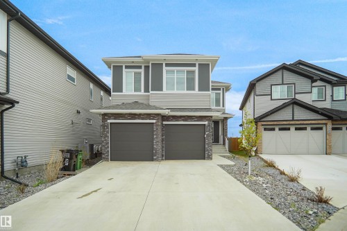 4709 Charles Bay Sw, Edmonton, AB - Outdoor With Facade
