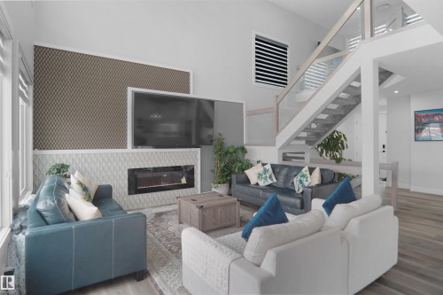4709 Charles Bay Sw, Edmonton, AB - Indoor Photo Showing Living Room With Fireplace