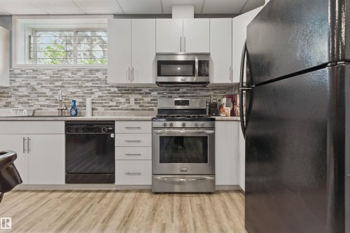 9716 160 Street Nw, Edmonton, AB - Indoor Photo Showing Kitchen With Upgraded Kitchen