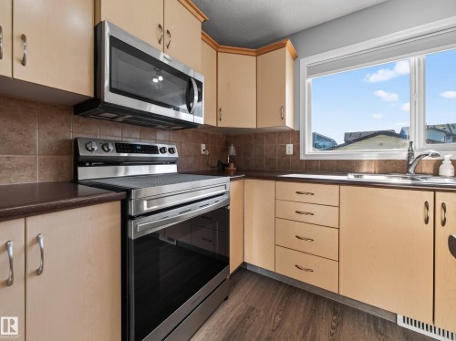 7835 Schmid Place Nw, Edmonton, AB - Indoor Photo Showing Kitchen With Double Sink
