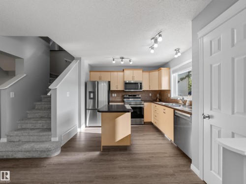 7835 Schmid Place Nw, Edmonton, AB - Indoor Photo Showing Kitchen With Double Sink
