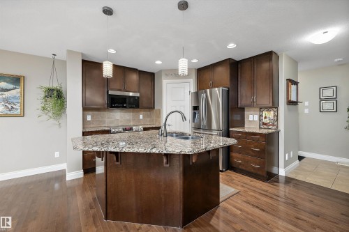 17332 6 Avenue Sw, Edmonton, AB - Indoor Photo Showing Kitchen With Double Sink With Upgraded Kitchen
