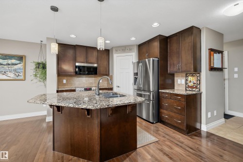 17332 6 Avenue Sw, Edmonton, AB - Indoor Photo Showing Kitchen With Double Sink With Upgraded Kitchen