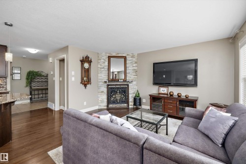 17332 6 Avenue Sw, Edmonton, AB - Indoor Photo Showing Living Room With Fireplace
