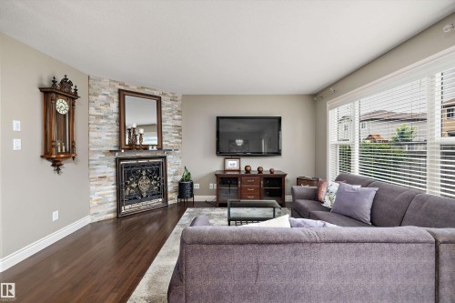 17332 6 Avenue Sw, Edmonton, AB - Indoor Photo Showing Living Room With Fireplace