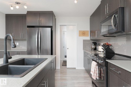 1757 Westerra Loop, Stony Plain, AB - Indoor Photo Showing Kitchen With Double Sink