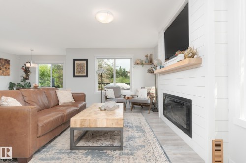 1757 Westerra Loop, Stony Plain, AB - Indoor Photo Showing Living Room With Fireplace