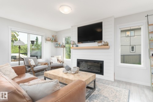 1757 Westerra Loop, Stony Plain, AB - Indoor Photo Showing Living Room With Fireplace