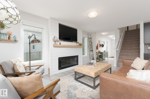 1757 Westerra Loop, Stony Plain, AB - Indoor Photo Showing Living Room With Fireplace