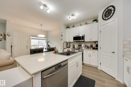 1020 Daniels Loop Sw, Edmonton, AB - Indoor Photo Showing Kitchen With Double Sink