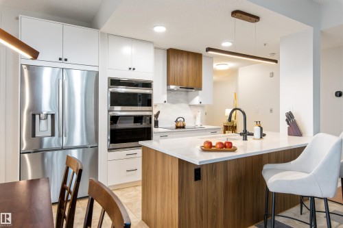 #105 10108 125 St Nw, Edmonton, AB - Indoor Photo Showing Kitchen With Upgraded Kitchen
