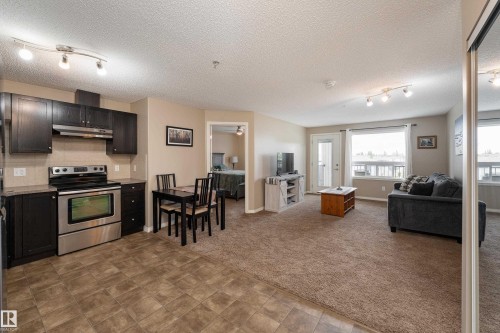 #339 1520 Hammond Ga Nw, Edmonton, AB - Indoor Photo Showing Kitchen With Stainless Steel Kitchen