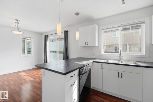 #18 13810 166 Av Nw, Edmonton, AB - Indoor Photo Showing Kitchen With Double Sink