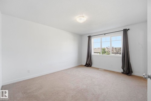 #18 13810 166 Av Nw, Edmonton, AB - Indoor Photo Showing Other Room