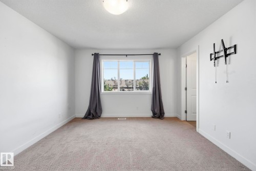 #18 13810 166 Av Nw, Edmonton, AB - Indoor Photo Showing Other Room