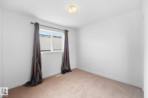 #18 13810 166 Av Nw, Edmonton, AB - Indoor Photo Showing Other Room