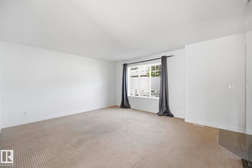 #18 13810 166 Av Nw, Edmonton, AB - Indoor Photo Showing Other Room