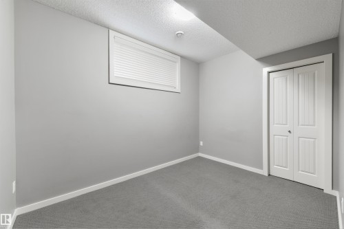 7058 Cardinal Way Sw, Edmonton, AB - Indoor Photo Showing Other Room