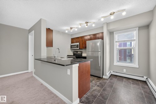 #222 5810 Mullen Pl Nw, Edmonton, AB - Indoor Photo Showing Kitchen