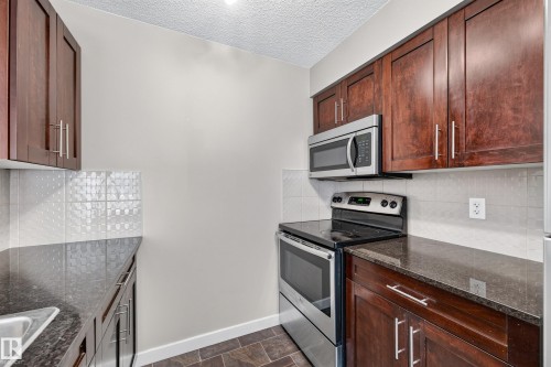 #222 5810 Mullen Pl Nw, Edmonton, AB - Indoor Photo Showing Kitchen