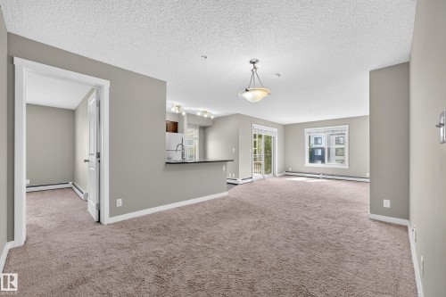#222 5810 Mullen Pl Nw, Edmonton, AB - Indoor Photo Showing Other Room