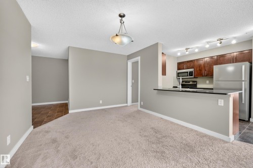 #222 5810 Mullen Pl Nw, Edmonton, AB - Indoor Photo Showing Kitchen