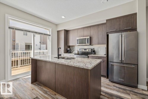 #4 1636 Kerr Rd Nw, Edmonton, AB - Indoor Photo Showing Kitchen With Stainless Steel Kitchen