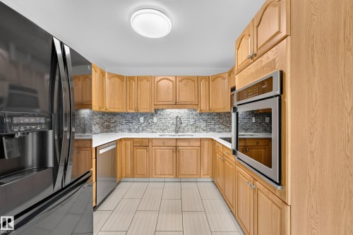 11727 27 Avenue Nw, Edmonton, AB - Indoor Photo Showing Kitchen With Upgraded Kitchen