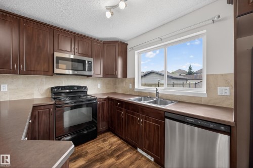 3634 12 Street Nw, Edmonton, AB - Indoor Photo Showing Kitchen With Double Sink