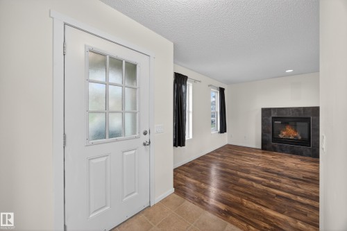 3634 12 Street Nw, Edmonton, AB - Indoor With Fireplace