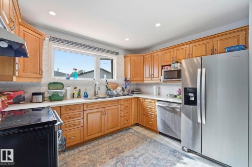 9302 165 Street Nw, Edmonton, AB - Indoor Photo Showing Kitchen With Double Sink