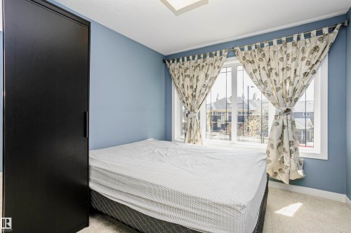 15848 13 Avenue Sw, Edmonton, AB - Indoor Photo Showing Bedroom