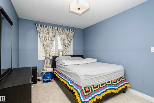 15848 13 Avenue Sw, Edmonton, AB - Indoor Photo Showing Bedroom