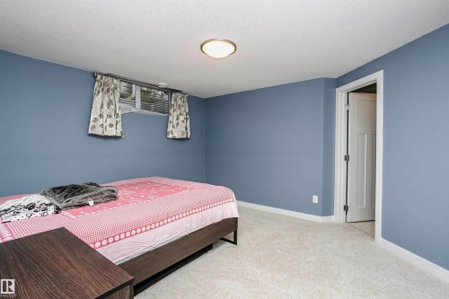 15848 13 Avenue Sw, Edmonton, AB - Indoor Photo Showing Bedroom